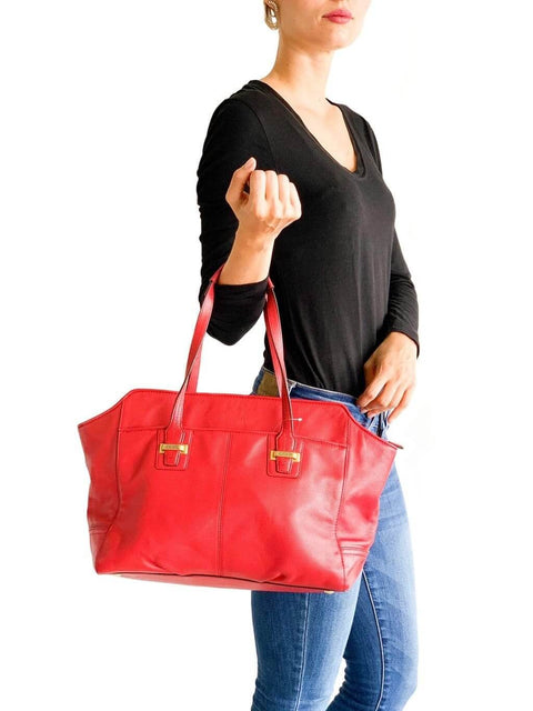 Cartera Coach