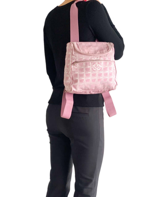 Morral "Monogram Canvas Travel Ligne Backpack"