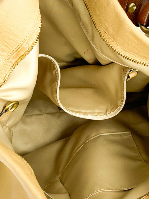 Cartera Coach