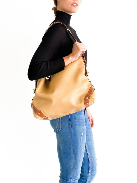 Cartera Coach