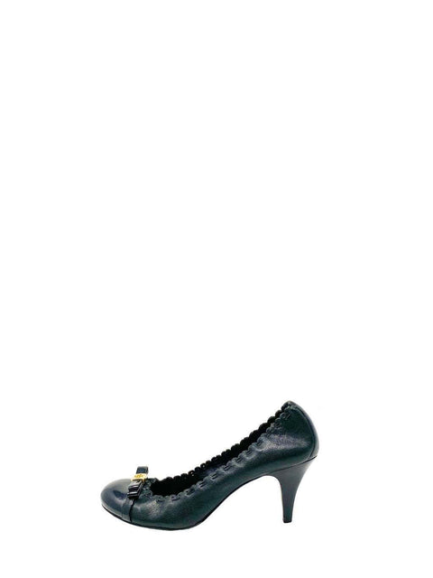 Tacones "Cap-Toe Pumps"