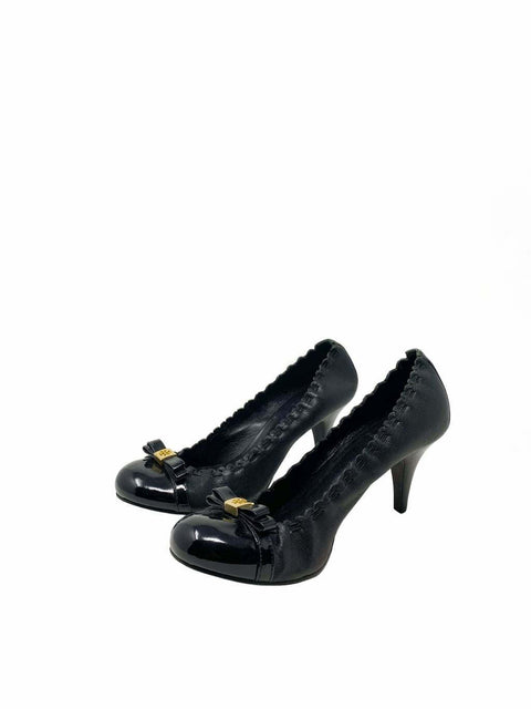 Tacones "Cap-Toe Pumps"