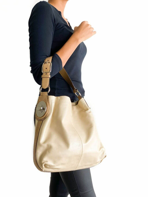 Cartera Coach