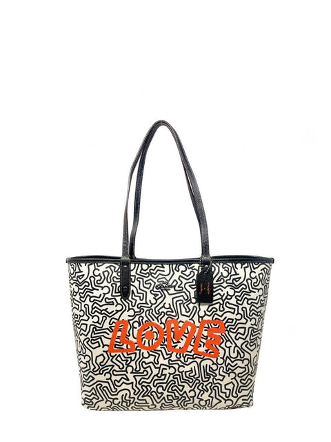 Cartera Coach