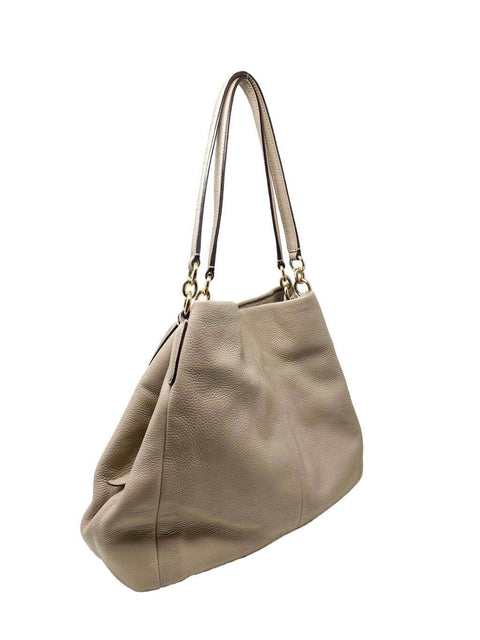 Cartera Coach