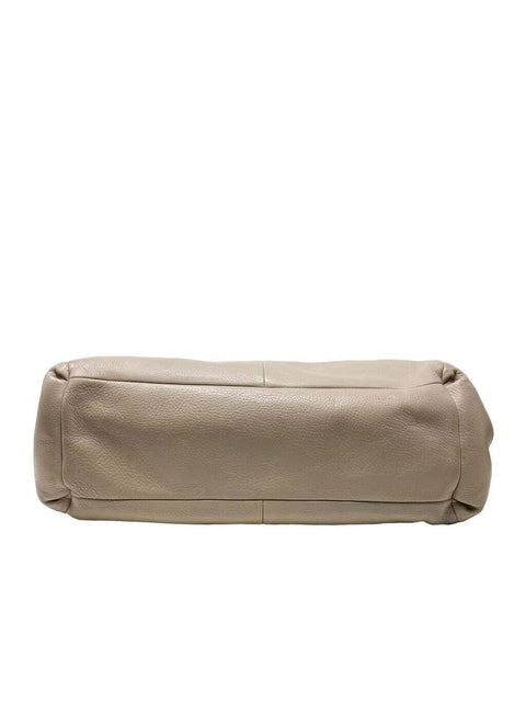 Cartera Coach