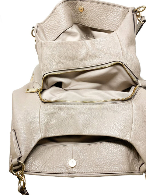 Cartera Coach