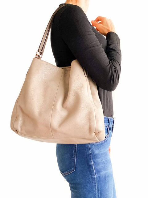 Cartera Coach