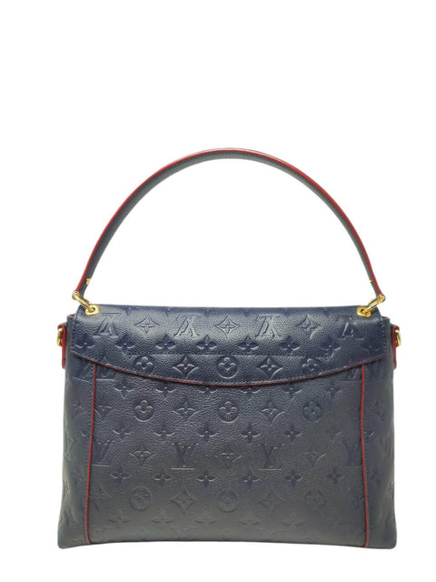 Cartera "Monogram Empreinte Blanche MM"
