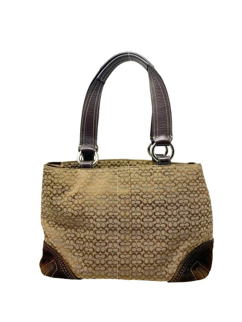 Cartera Coach