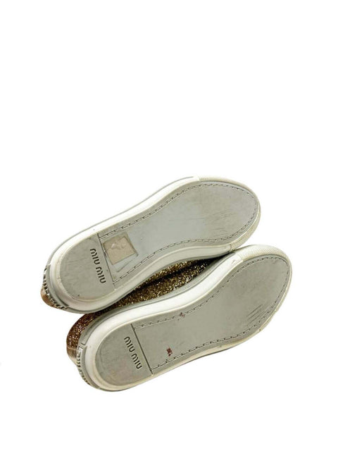 Tenis Dorados