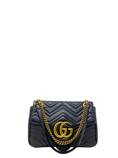 Cartera “GG Marmont medium matelassé shoulder bag”
