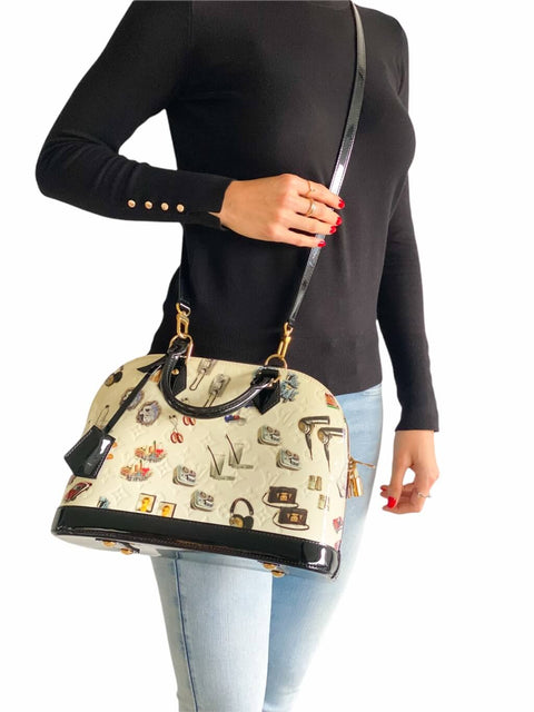 Cartera "Monogram Vernis Stickers Alma"