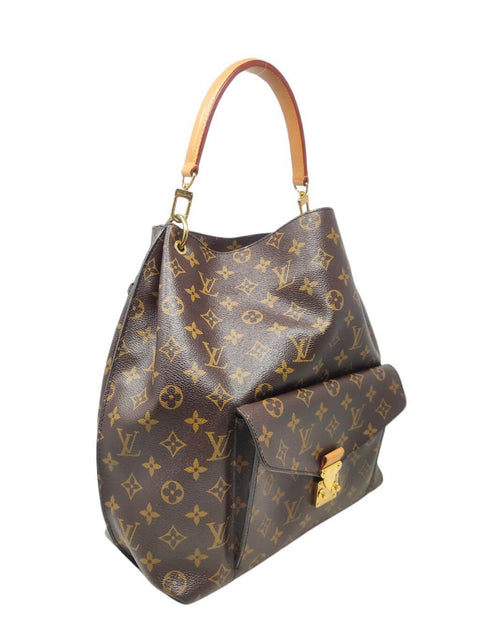 Cartera "Monogram Métis Hobo"