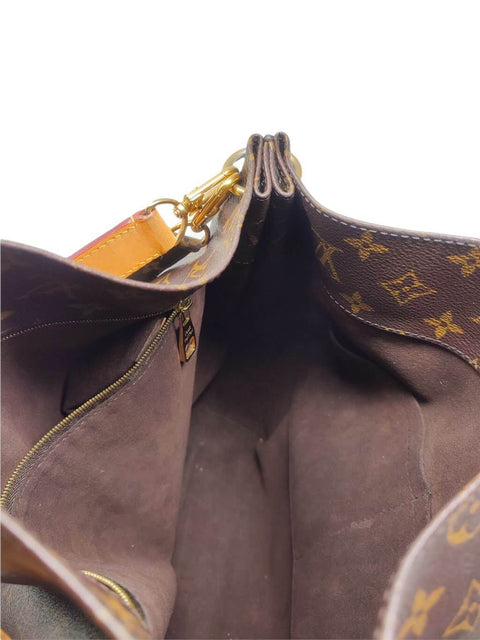 Cartera "Monogram Métis Hobo"
