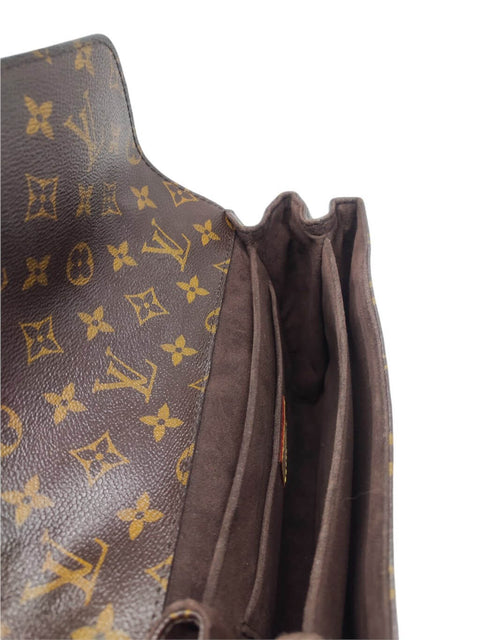 Cartera "Monogram Pochette Métis"