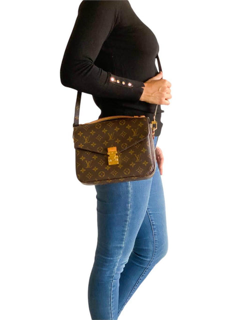 Cartera "Monogram Pochette Métis"