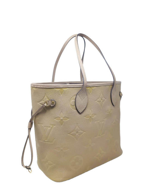 Bolso "Monogram Giant Empreinte Neverfull MM"