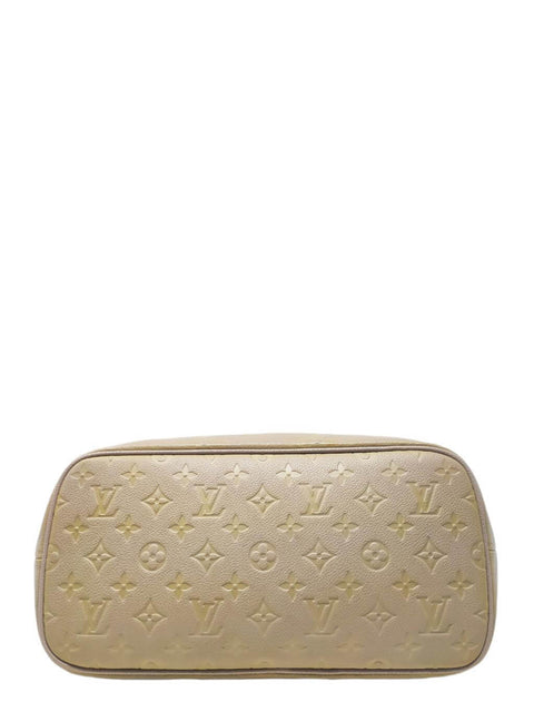 Bolso "Monogram Giant Empreinte Neverfull MM"