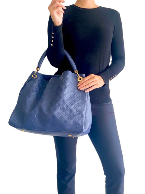 Bolso "Monogram Empreinte Artsy MM"