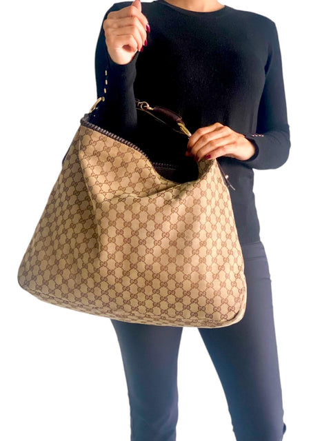 Bolso "Monogram Large Horsebit Chain Hobo"