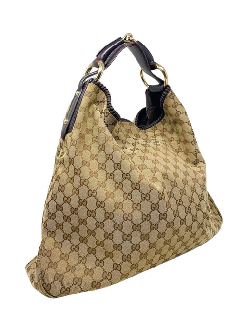 Bolso "Monogram Large Horsebit Chain Hobo"