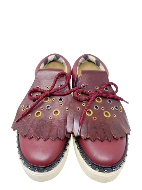 Tenis "Kiltie Fringe Leather Sneakers"
