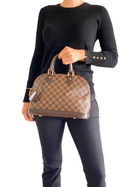 Bolso "Damier Ebene Alma"